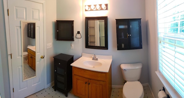 547 Grindstone Hollow Rd, Dickson, TN 37055 - bathroom with toilet, vanity, tile patterned floors, and baseboards