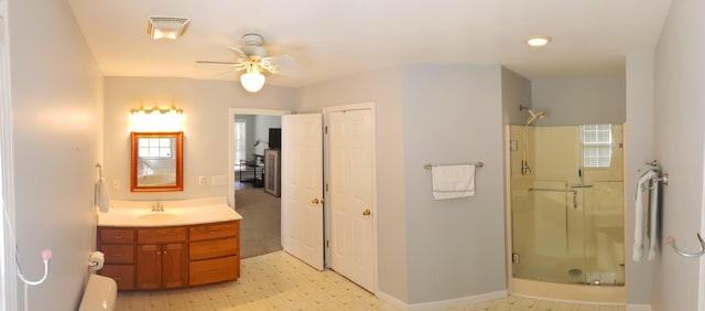 547 Grindstone Hollow Rd, Dickson, TN 37055 - full bath featuring a stall shower, vanity, ceiling fan, and tile patterned floors