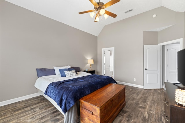 bedroom with dark wood-type flooring, visible vents, high vaulted ceiling, and baseboards
