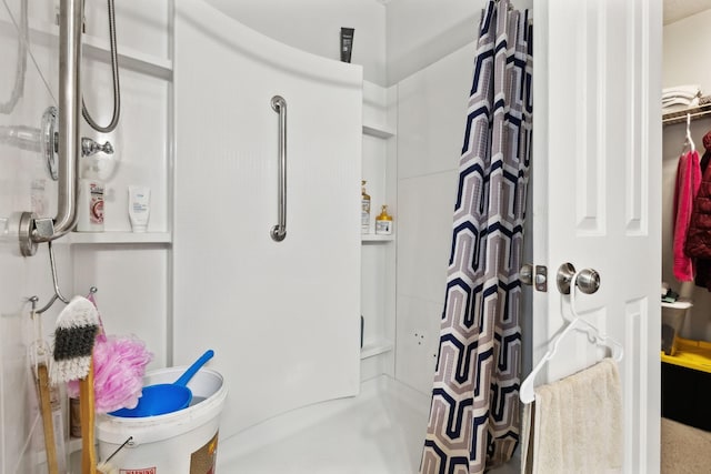 full bathroom featuring a shower stall