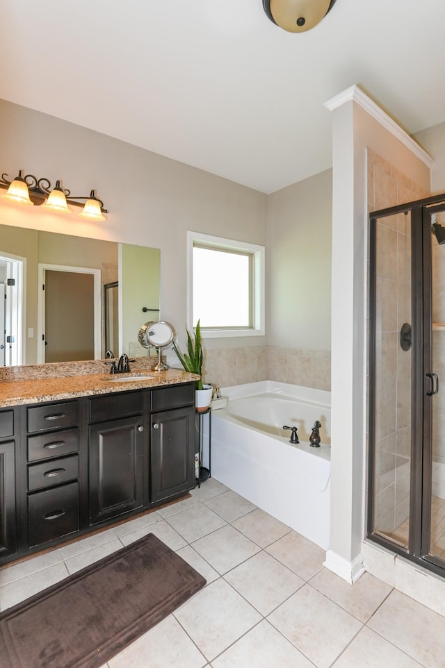 full bathroom with vanity, tile patterned flooring, a garden tub, and a shower stall