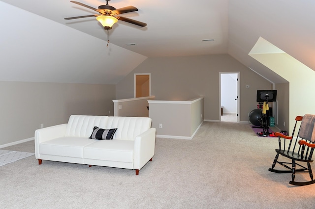 sitting room with carpet flooring, ceiling fan, and lofted ceiling