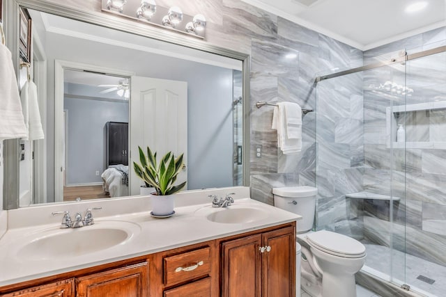 bathroom with a sink, crown molding, and a stall shower