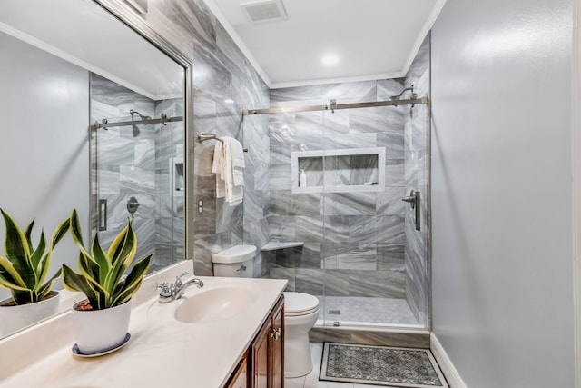bathroom with crown molding, toilet, visible vents, and vanity