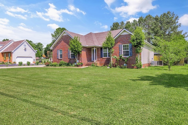 single story home featuring brick siding and a front lawn