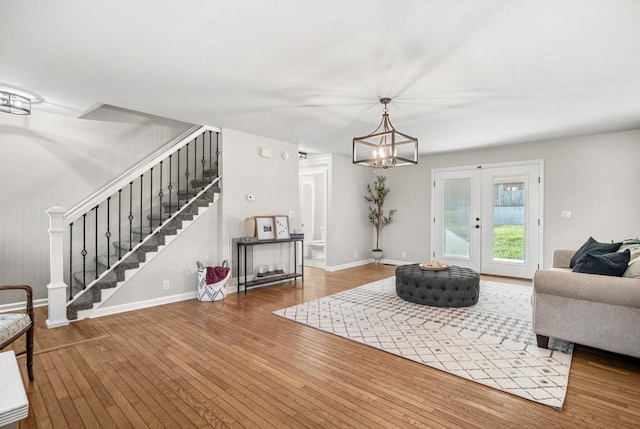 174 Hickory Ln, Jacksboro, TN 37757 - living room with hardwood / wood-style floors, baseboards, stairs, and french doors