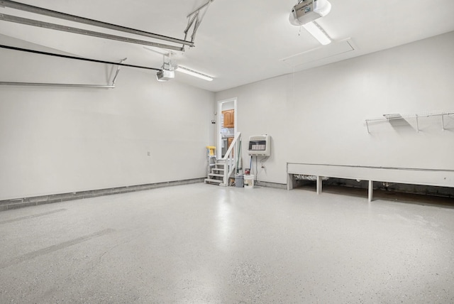 174 Hickory Ln, Jacksboro, TN 37757 - garage with a garage door opener and heating unit