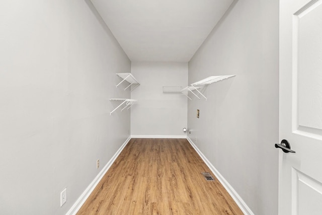 174 Hickory Ln, Jacksboro, TN 37757 - spacious closet with visible vents and light wood-style floors