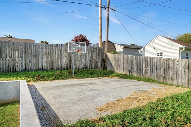 174 Hickory Ln, Jacksboro, TN 37757 - view of patio featuring basketball court and fence