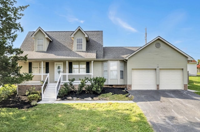 174 Hickory Ln, Jacksboro, TN 37757 - cape cod-style house with a garage, a porch, aphalt driveway, and a shingled roof