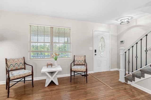 174 Hickory Ln, Jacksboro, TN 37757 - foyer with stairs, hardwood / wood-style flooring, and baseboards