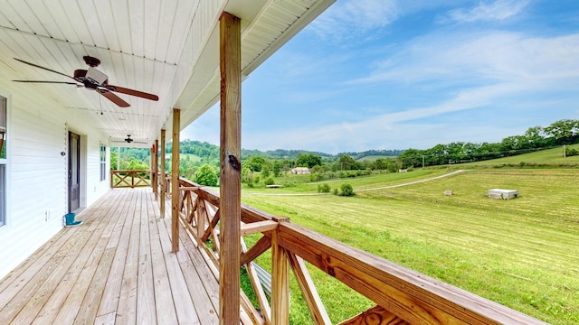 1344 French Brantley Rd, Wartrace, TN 37183 - wooden porch with a lawn, ceiling fan, and view of wooded area