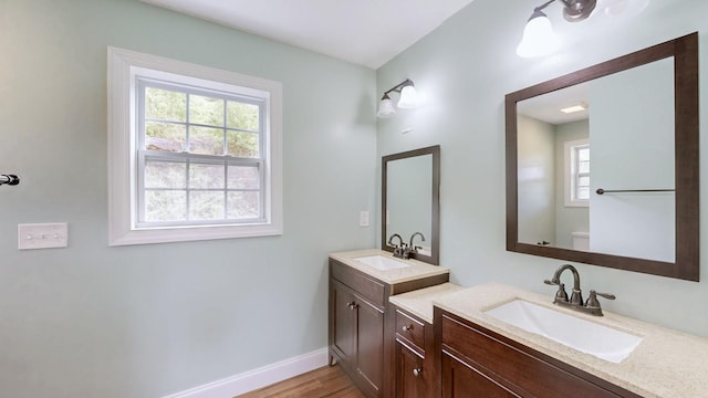 1344 French Brantley Rd, Wartrace, TN 37183 - bathroom with vanity, toilet, wood finished floors, and baseboards