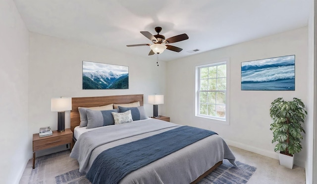 1344 French Brantley Rd, Wartrace, TN 37183 - bedroom with baseboards, a ceiling fan, and light carpet