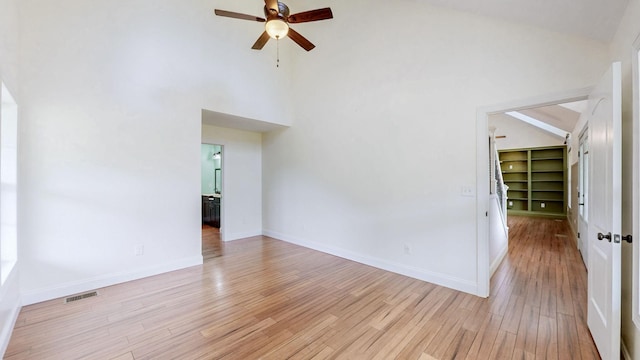 1344 French Brantley Rd, Wartrace, TN 37183 - empty room featuring ceiling fan, light wood-style floors, baseboards, and high vaulted ceiling