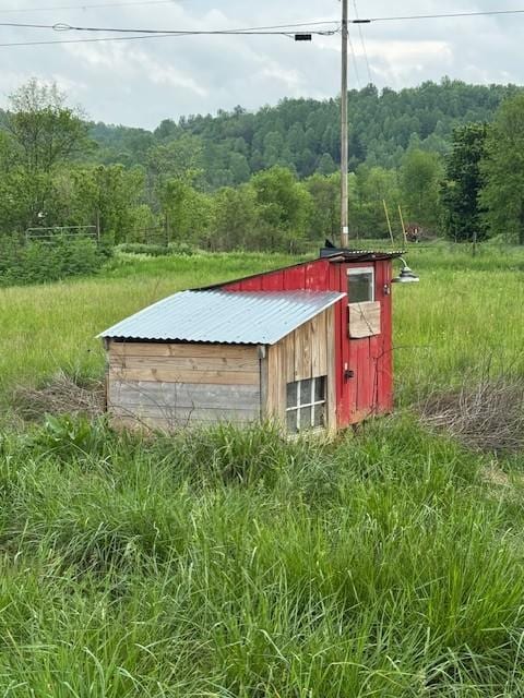 1344 French Brantley Rd, Wartrace, TN 37183 - view of outbuilding with a wooded view