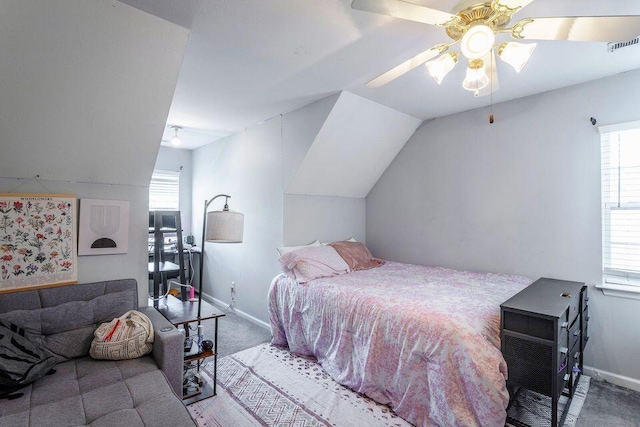8424 Shadetree Ln, Ooltewah, TN 37363 - carpeted bedroom with multiple windows, a ceiling fan, baseboards, and lofted ceiling