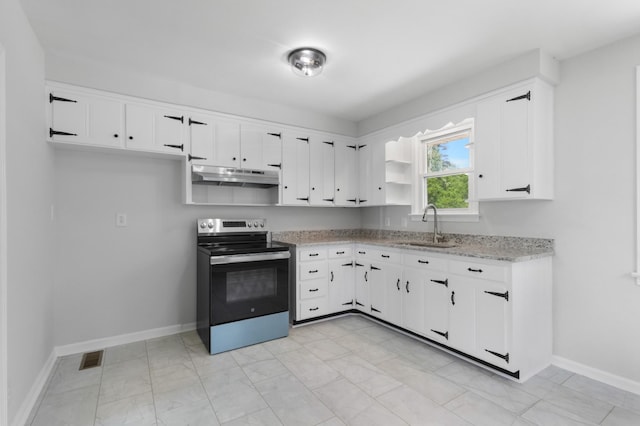 kitchen with a sink, baseboards, white cabinets, stainless steel electric stove, and under cabinet range hood
