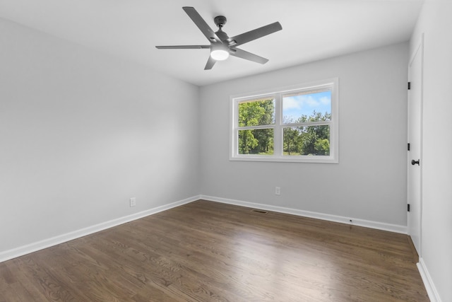 466 Lafayette Rd, Clarksville, TN 37042 - unfurnished room featuring baseboards, a ceiling fan, dark wood-style floors, and visible vents