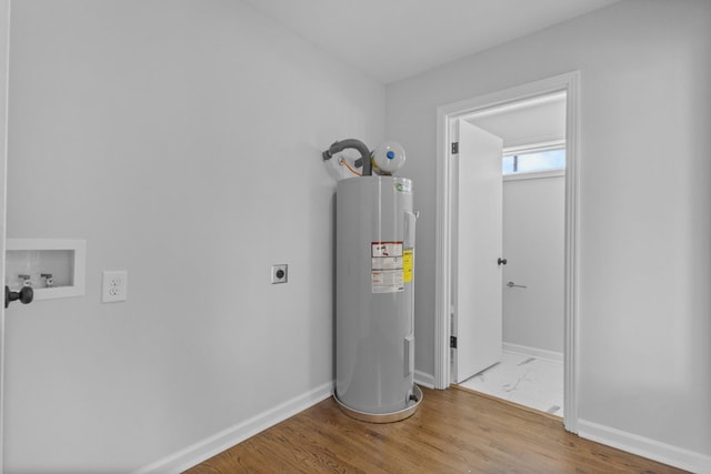 466 Lafayette Rd, Clarksville, TN 37042 - utility room featuring electric water heater