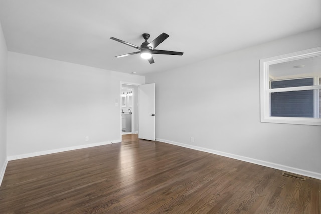 466 Lafayette Rd, Clarksville, TN 37042 - unfurnished bedroom featuring visible vents, dark wood finished floors, ceiling fan, and baseboards