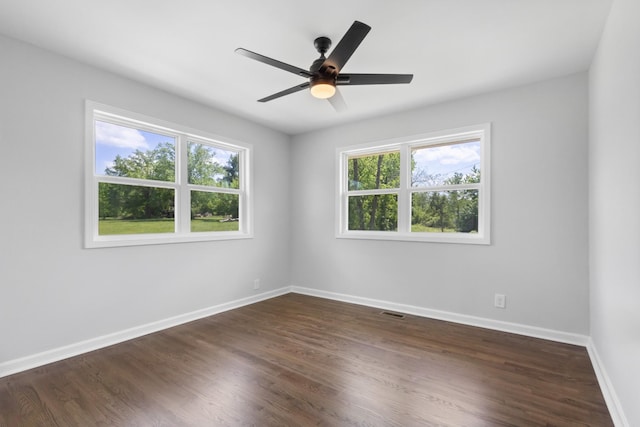 466 Lafayette Rd, Clarksville, TN 37042 - empty room featuring baseboards, ceiling fan, dark wood-style floors, and visible vents