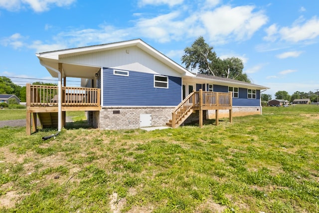 466 Lafayette Rd, Clarksville, TN 37042 - back of house with stairs, a wooden deck, and a yard