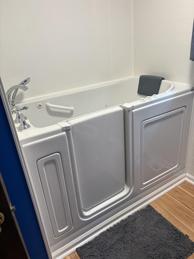 1400 Dogwood Ln, Lafayette, TN 37083 - washroom featuring washer / dryer and wood finished floors