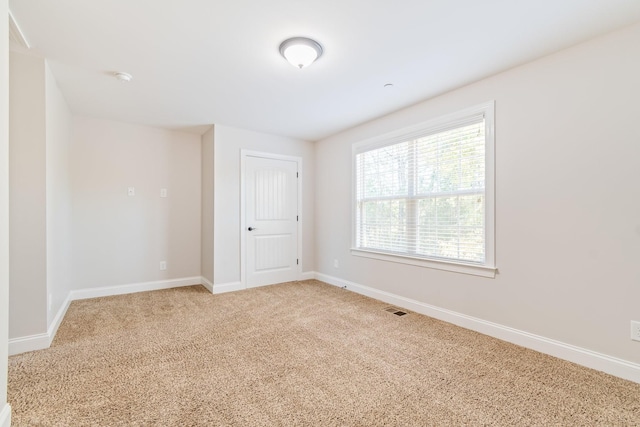 1041 Irish Way, Spring Hill, TN 37174 - empty room with light colored carpet, visible vents, and baseboards