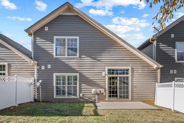 1041 Irish Way, Spring Hill, TN 37174 - rear view of property featuring fence, a lawn, and a patio