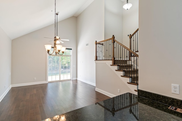 1041 Irish Way, Spring Hill, TN 37174 - stairs with wood finished floors, baseboards, high vaulted ceiling, and ceiling fan with notable chandelier