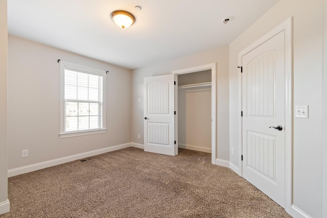 1041 Irish Way, Spring Hill, TN 37174 - unfurnished bedroom with carpet, visible vents, a closet, and baseboards