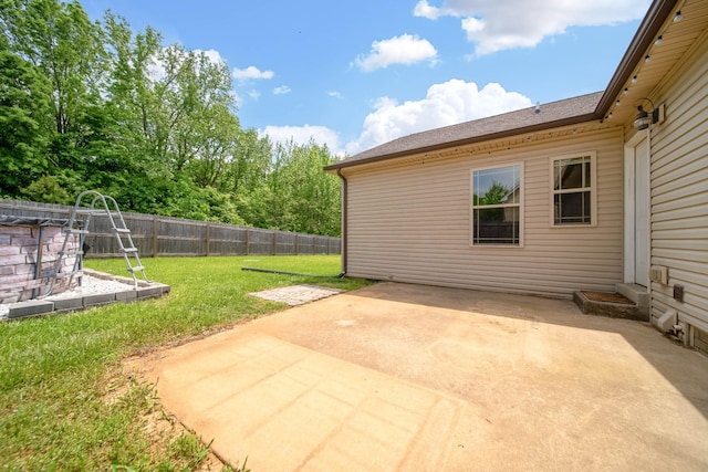 view of yard featuring a fenced backyard and a patio area