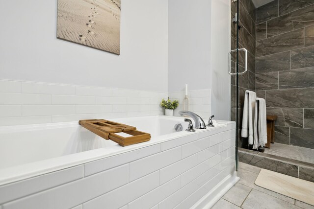 605 Longfellow Ln, Smyrna, TN 37167 - full bathroom with a stall shower, tile patterned flooring, and a bath