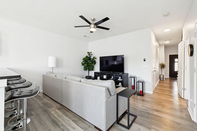 605 Longfellow Ln, Smyrna, TN 37167 - living room featuring ceiling fan, light wood-type flooring, visible vents, and baseboards