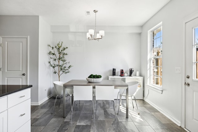 605 Longfellow Ln, Smyrna, TN 37167 - dining area with visible vents, an inviting chandelier, and baseboards