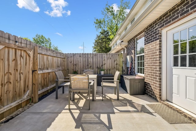 605 Longfellow Ln, Smyrna, TN 37167 - view of patio featuring outdoor dining space and a fenced backyard