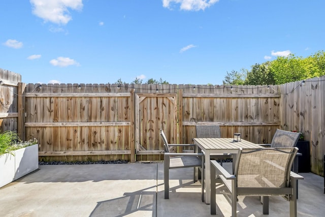 605 Longfellow Ln, Smyrna, TN 37167 - view of patio featuring outdoor dining space and a fenced backyard