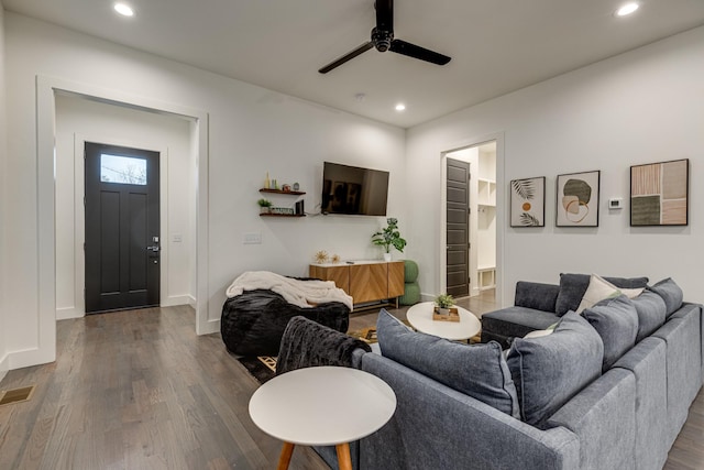 living room with dark wood finished floors, recessed lighting, ceiling fan, baseboards, and visible vents
