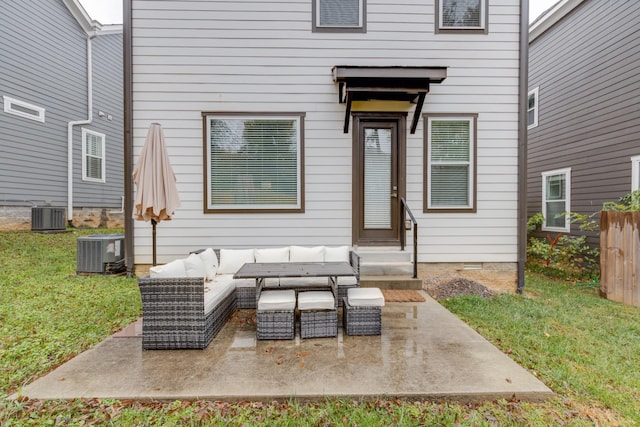 view of patio / terrace featuring central AC, fence, and an outdoor hangout area