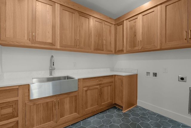 95 Leonard Ave Unit 1, Nashville, TN 37205 - clothes washing area with electric dryer hookup, cabinet space, washer hookup, and dark tile patterned floors