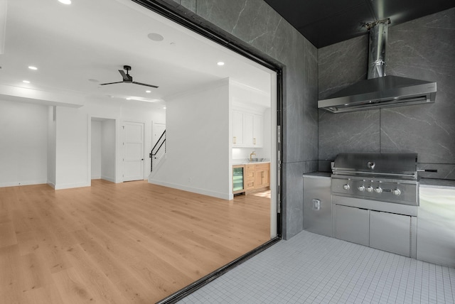 95 Leonard Ave Unit 1, Nashville, TN 37205 - kitchen with a ceiling fan, crown molding, recessed lighting, light wood-style flooring, and wine cooler