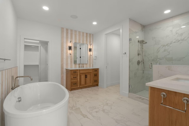 95 Leonard Ave Unit 1, Nashville, TN 37205 - bathroom with a marble finish shower, marble finish floors, vanity, recessed lighting, and a freestanding tub