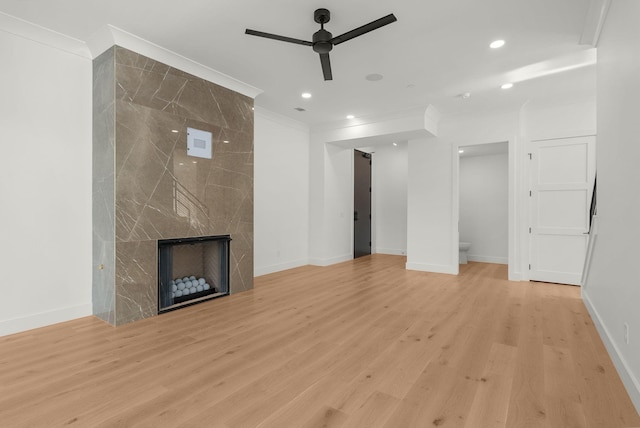 95 Leonard Ave Unit 1, Nashville, TN 37205 - unfurnished living room featuring ornamental molding, ceiling fan, recessed lighting, a premium fireplace, and baseboards