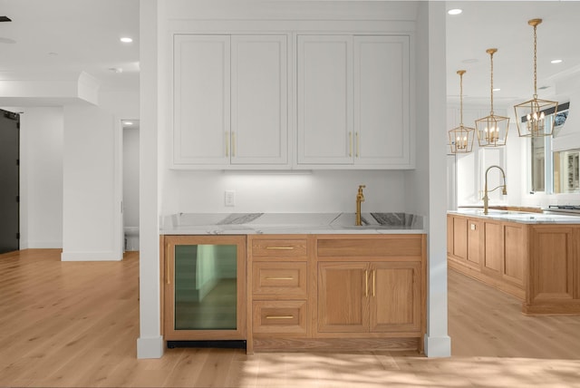 95 Leonard Ave Unit 1, Nashville, TN 37205 - bar with a sink, light wood finished floors, wine cooler, recessed lighting, and pendant lighting