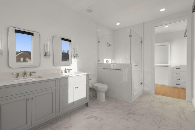95 Leonard Ave Unit 1, Nashville, TN 37205 - full bath with toilet, marble look tile flooring, a stall shower, double vanity, and recessed lighting