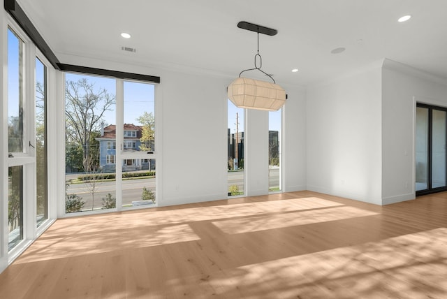 95 Leonard Ave Unit 1, Nashville, TN 37205 - unfurnished dining area with wood finished floors, baseboards, ornamental molding, and recessed lighting