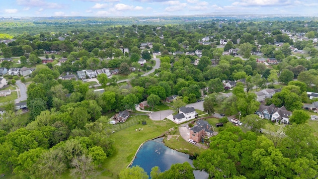 bird's eye view featuring a residential view and a water view