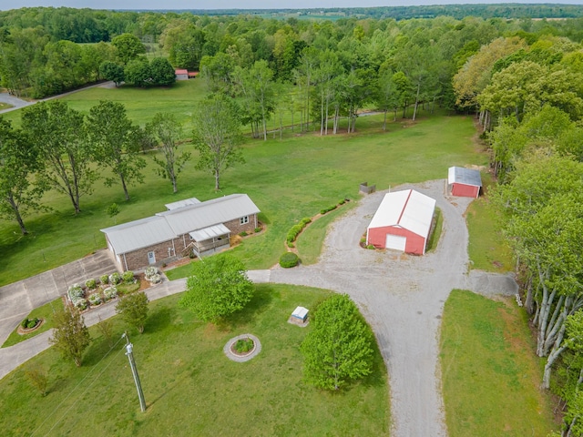 drone / aerial view featuring a forest view