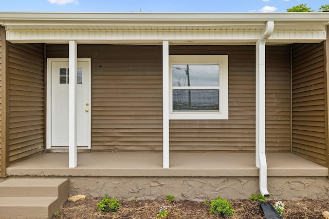 entrance to property with a porch